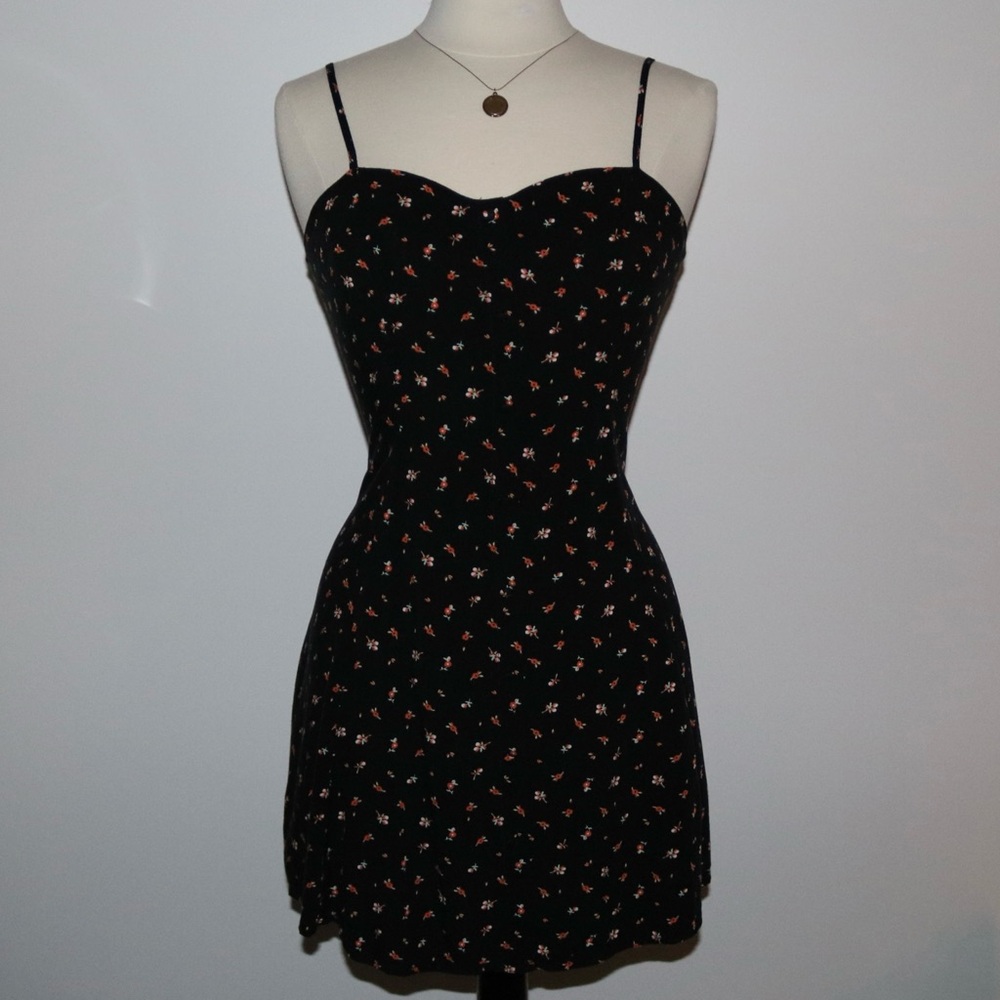 Black flowy mini dress with flowers and button up front